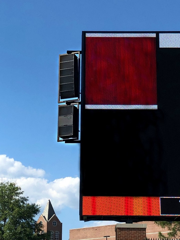 Polar Focus rigging for JBL VLA loudspeakers on a scoreboard at Mercer University.